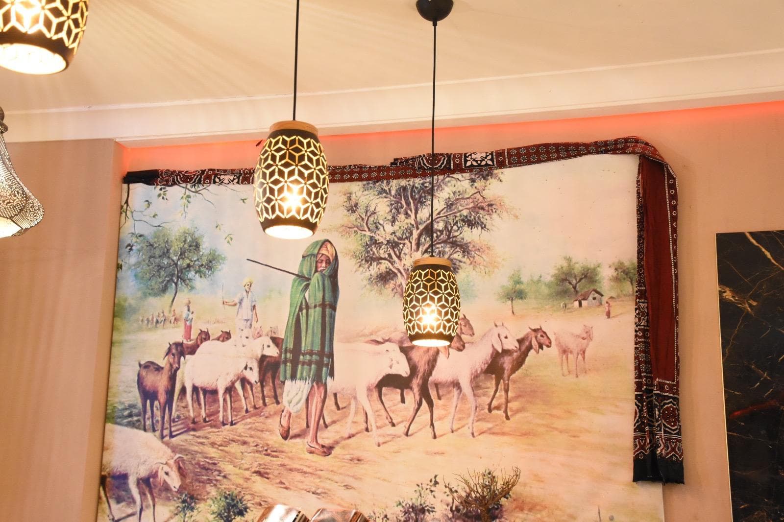 Heritage artwork and warm interior details inside Aladin